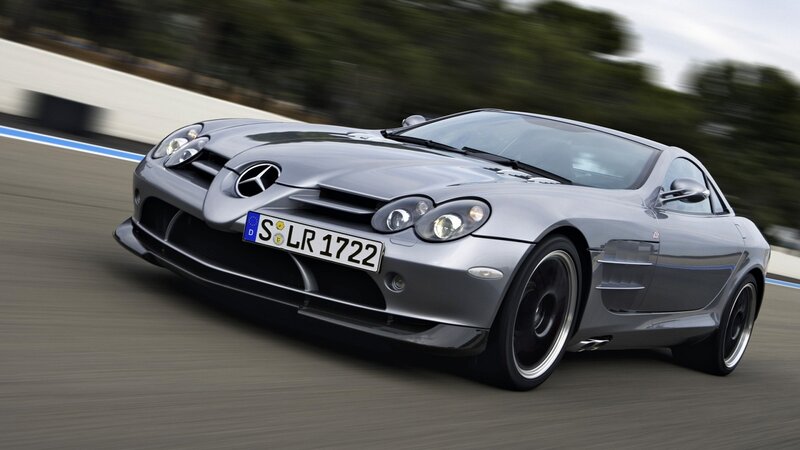 silver mercedes-benz slr on track