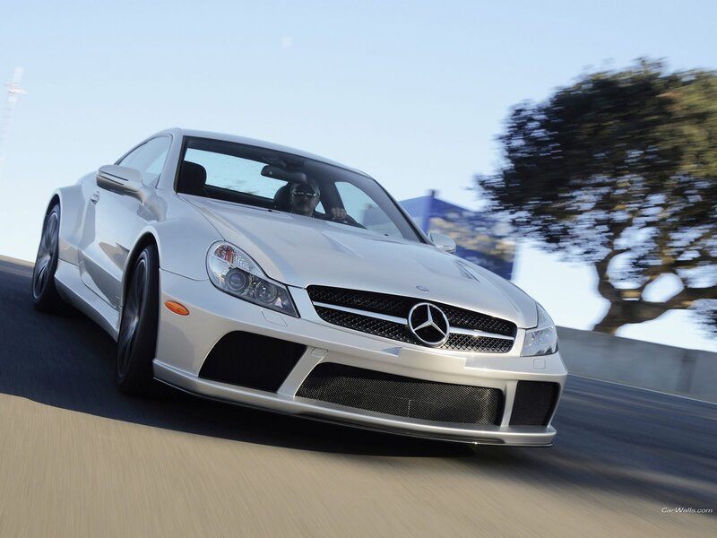 silver mercedes-benz sls amg in motion