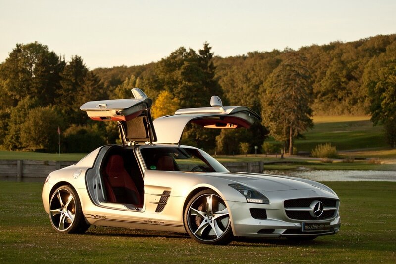 Silver Mercedes-Benz SLS AMG on a golf course