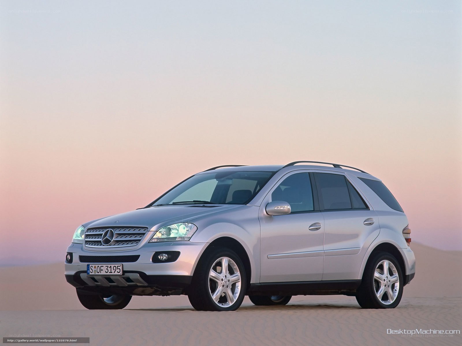 silver mercedes-benz suv in desert