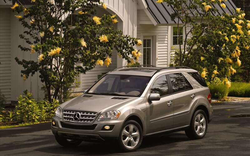Silver Mercedes-Benz SUV in driveway