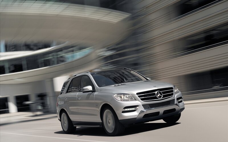 Silver Mercedes-Benz SUV in motion