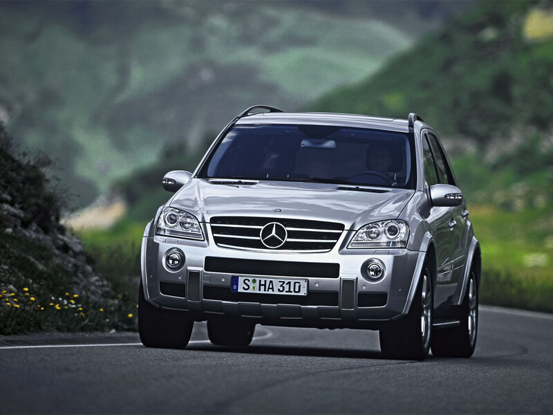 Silver Mercedes-Benz SUV on mountain road