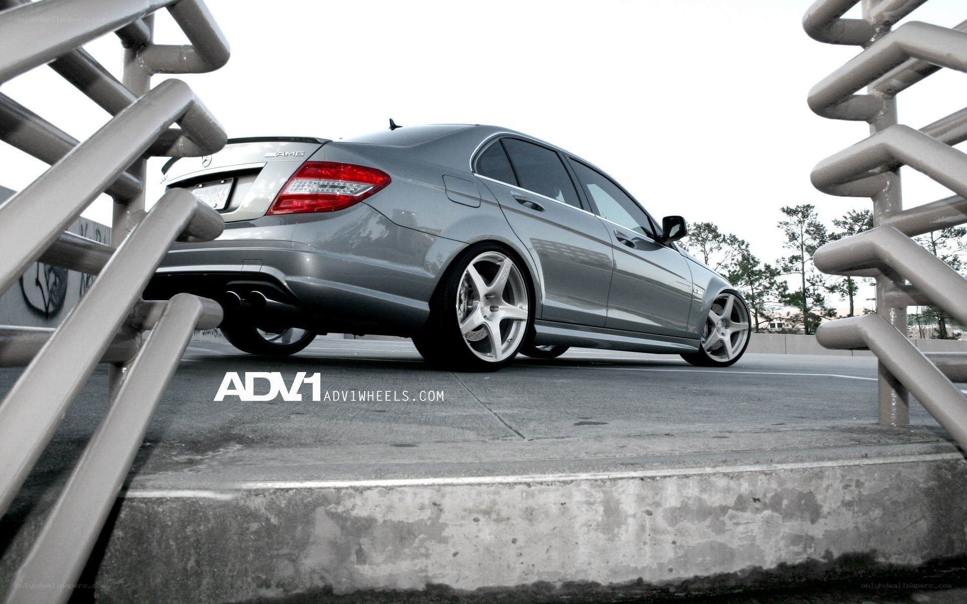 silver mercedes-benz with custom wheels