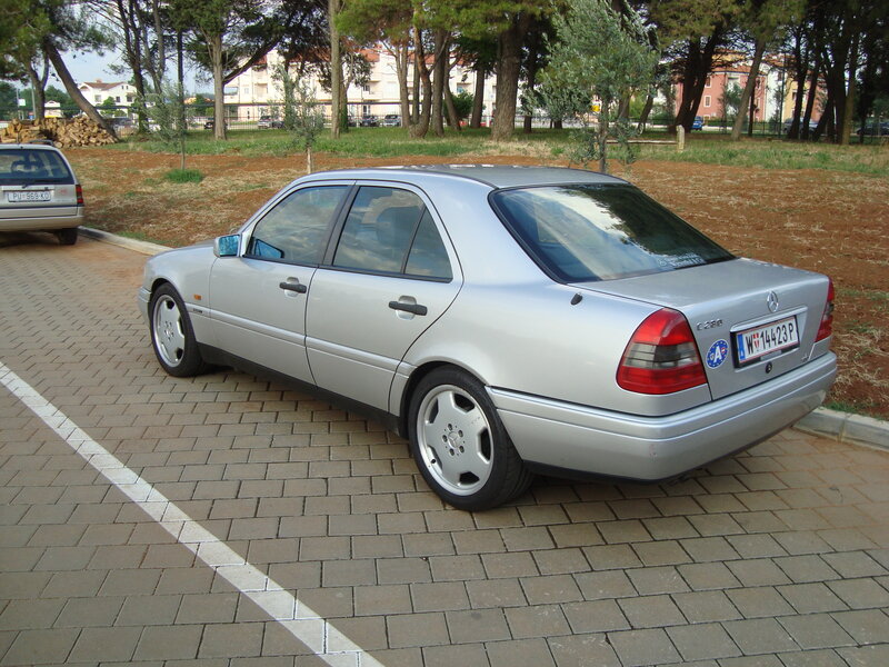 silver mercedes c230 parked