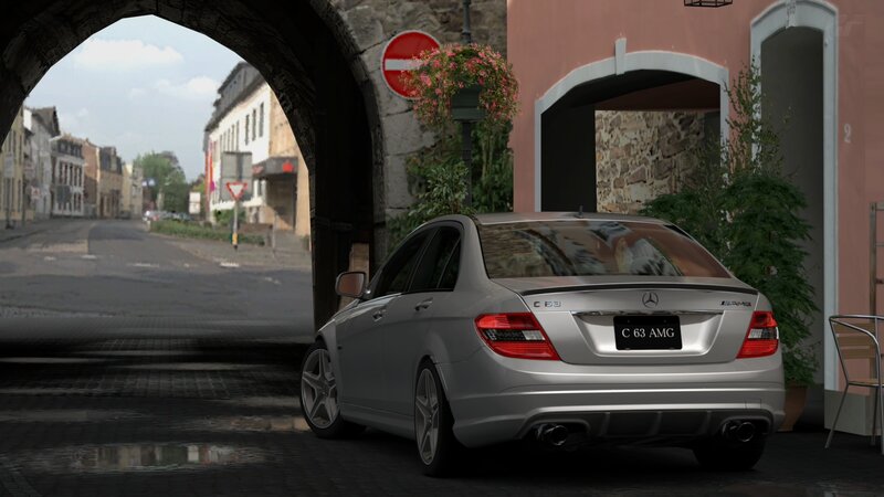 Silver Mercedes C63 AMG in city