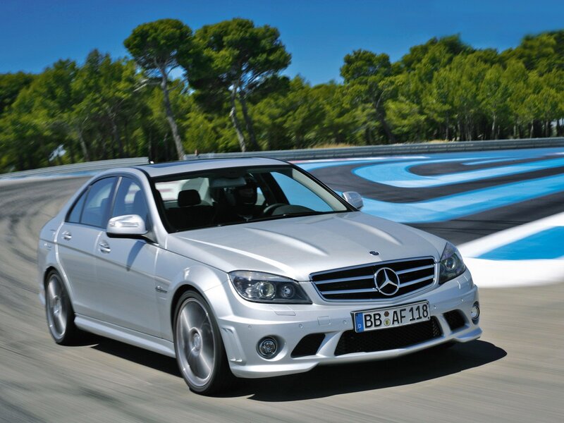 Silver Mercedes C63 AMG on track