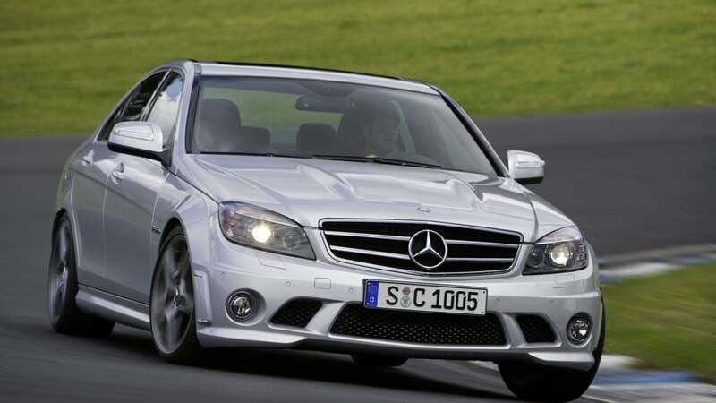 silver mercedes c63 amg on track