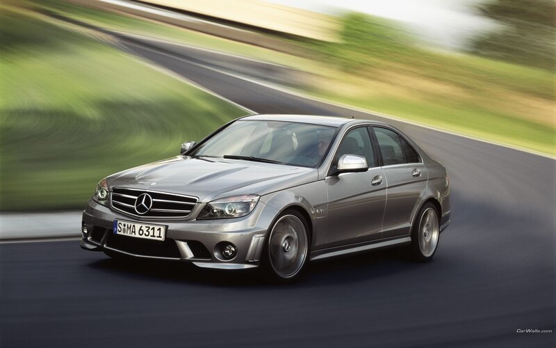 silver mercedes c63 amg on track