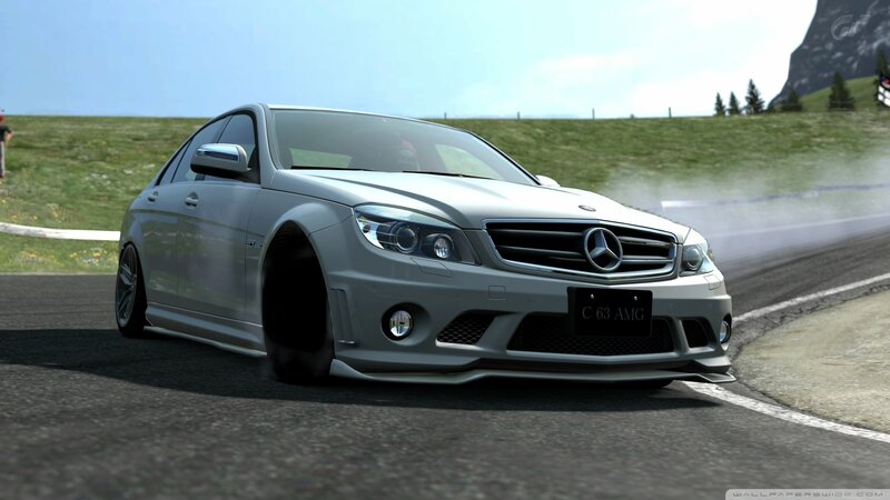silver mercedes c63 amg on track