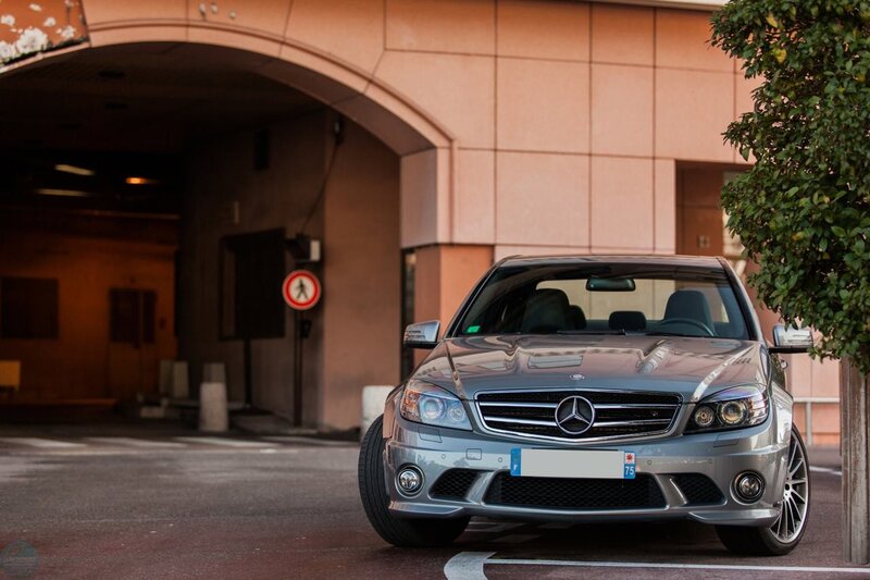 silver mercedes c63 amg parked