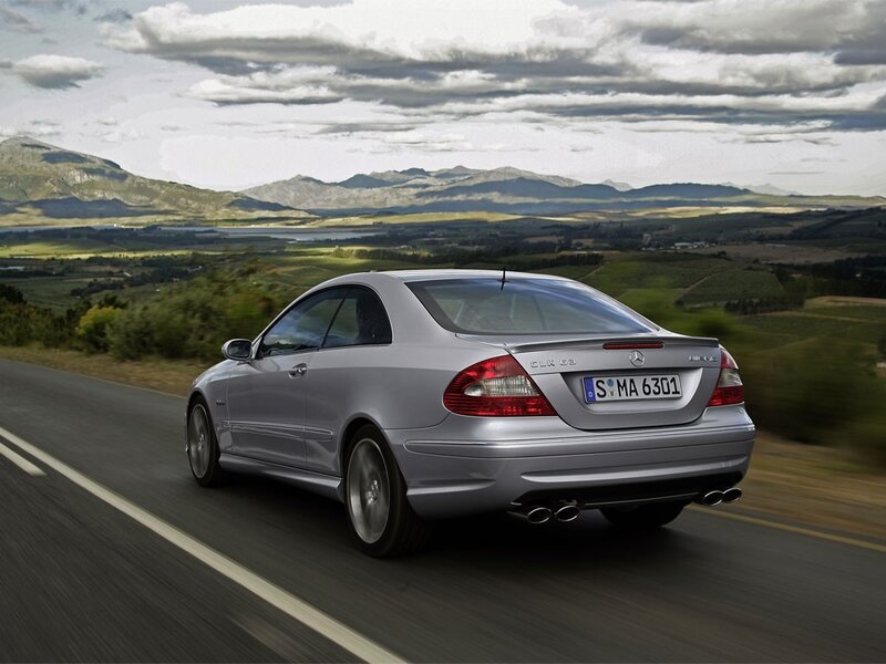 silver mercedes driving on road