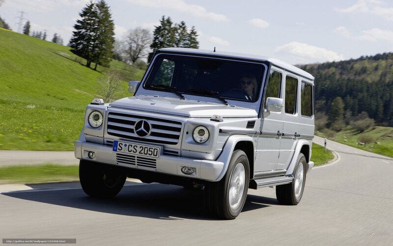 silver mercedes g-class on road