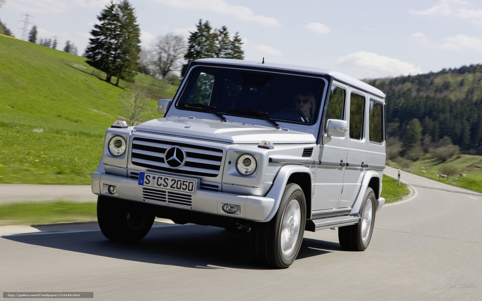 silver mercedes g-class on road
