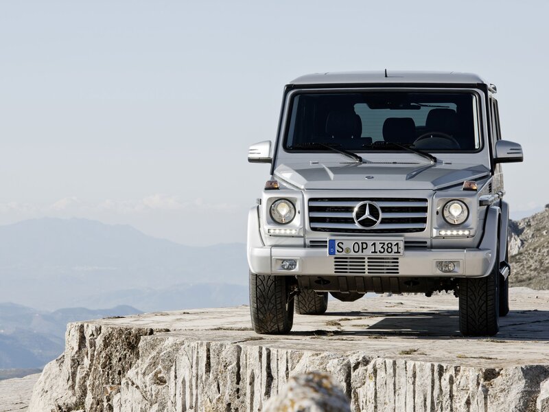 Silver Mercedes G-Wagen on cliff
