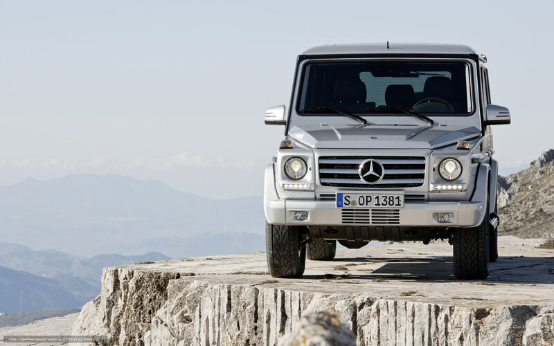 Silver Mercedes G-Wagen on cliff