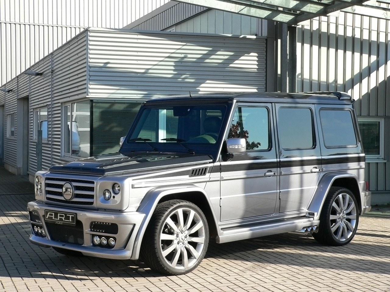 silver mercedes g-wagon suv
