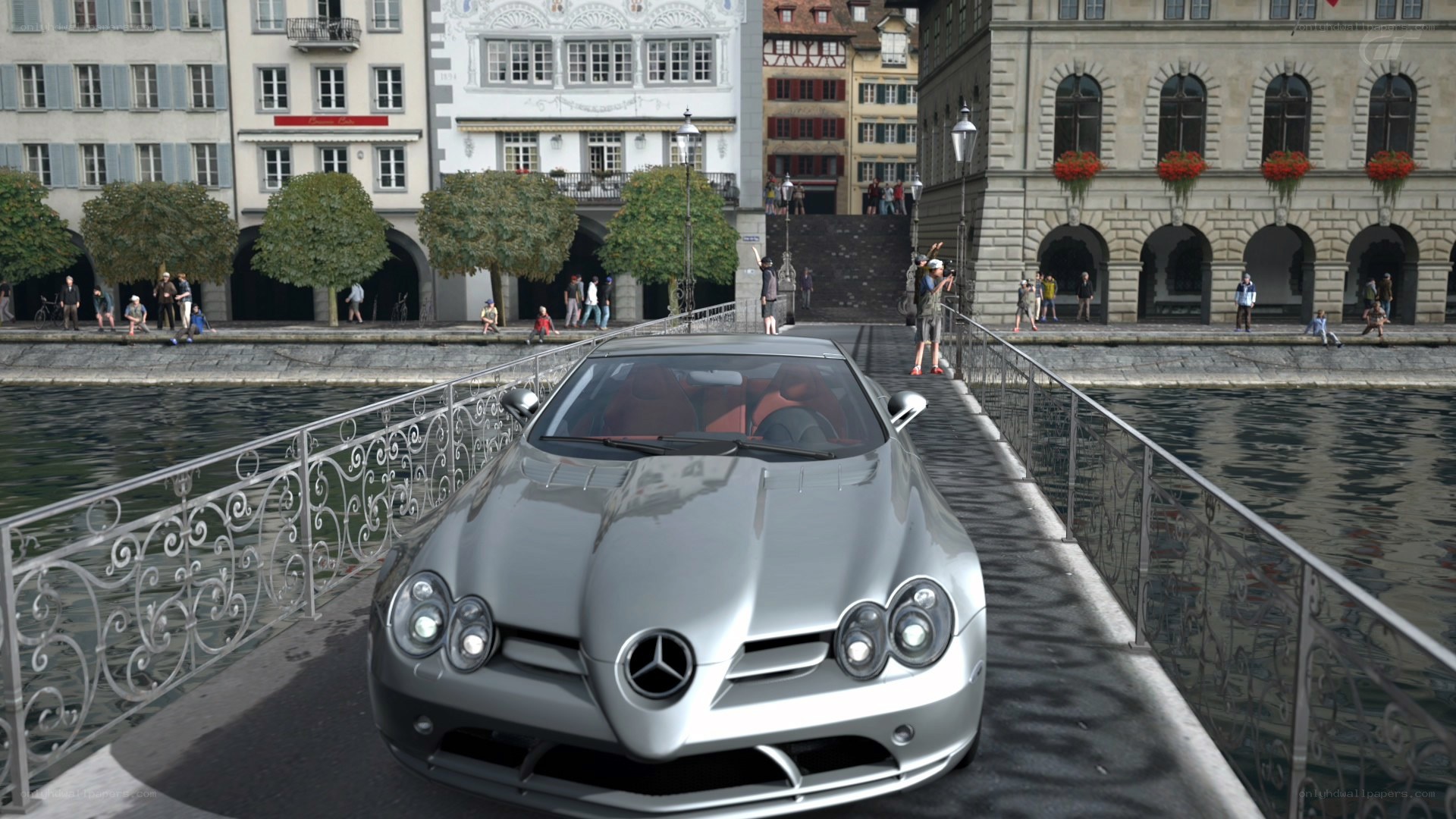 Silver Mercedes on a bridge