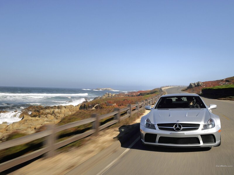 Silver Mercedes on coastal road