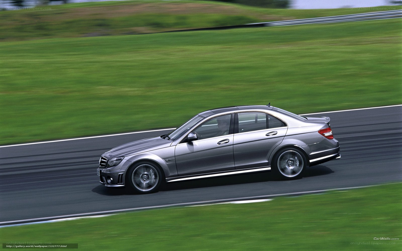 silver mercedes on racetrack