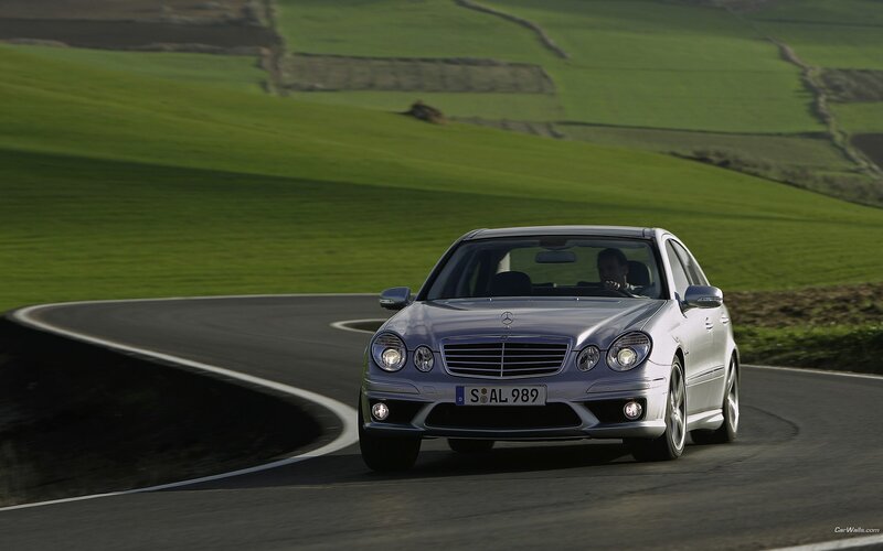 silver mercedes on winding road