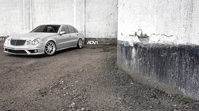 silver mercedes parked in alley