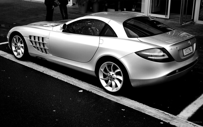 Silver Mercedes SLR parked