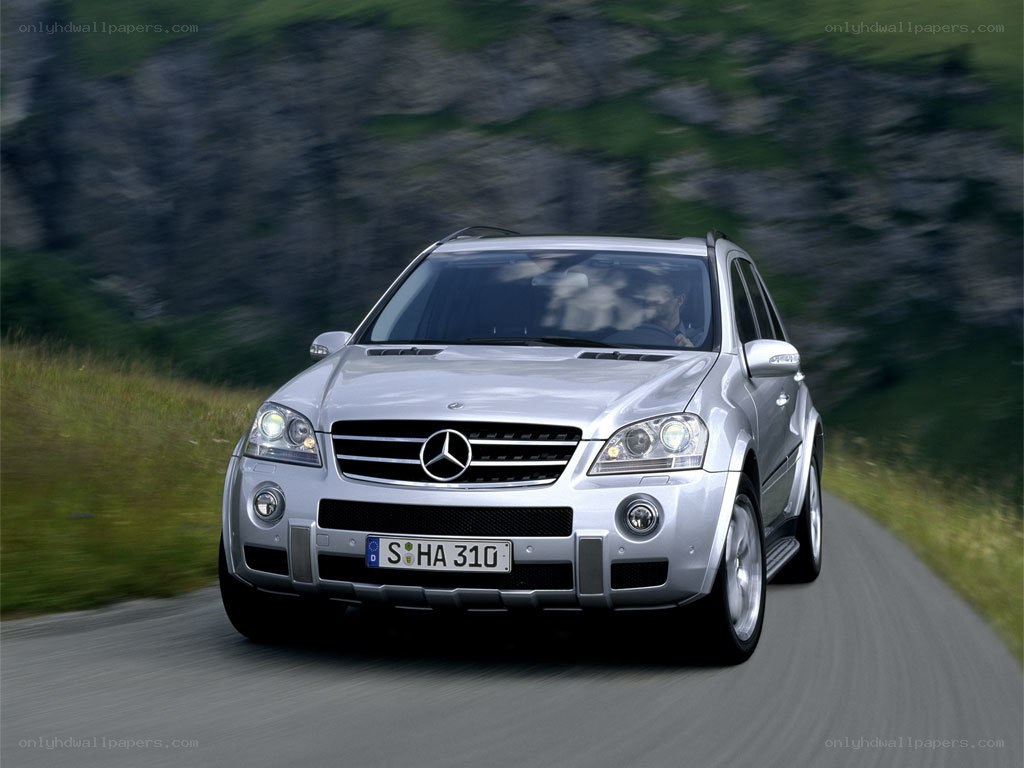 silver mercedes suv on road