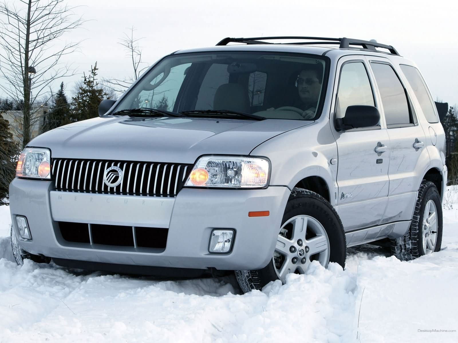 silver mercury mariner in snow