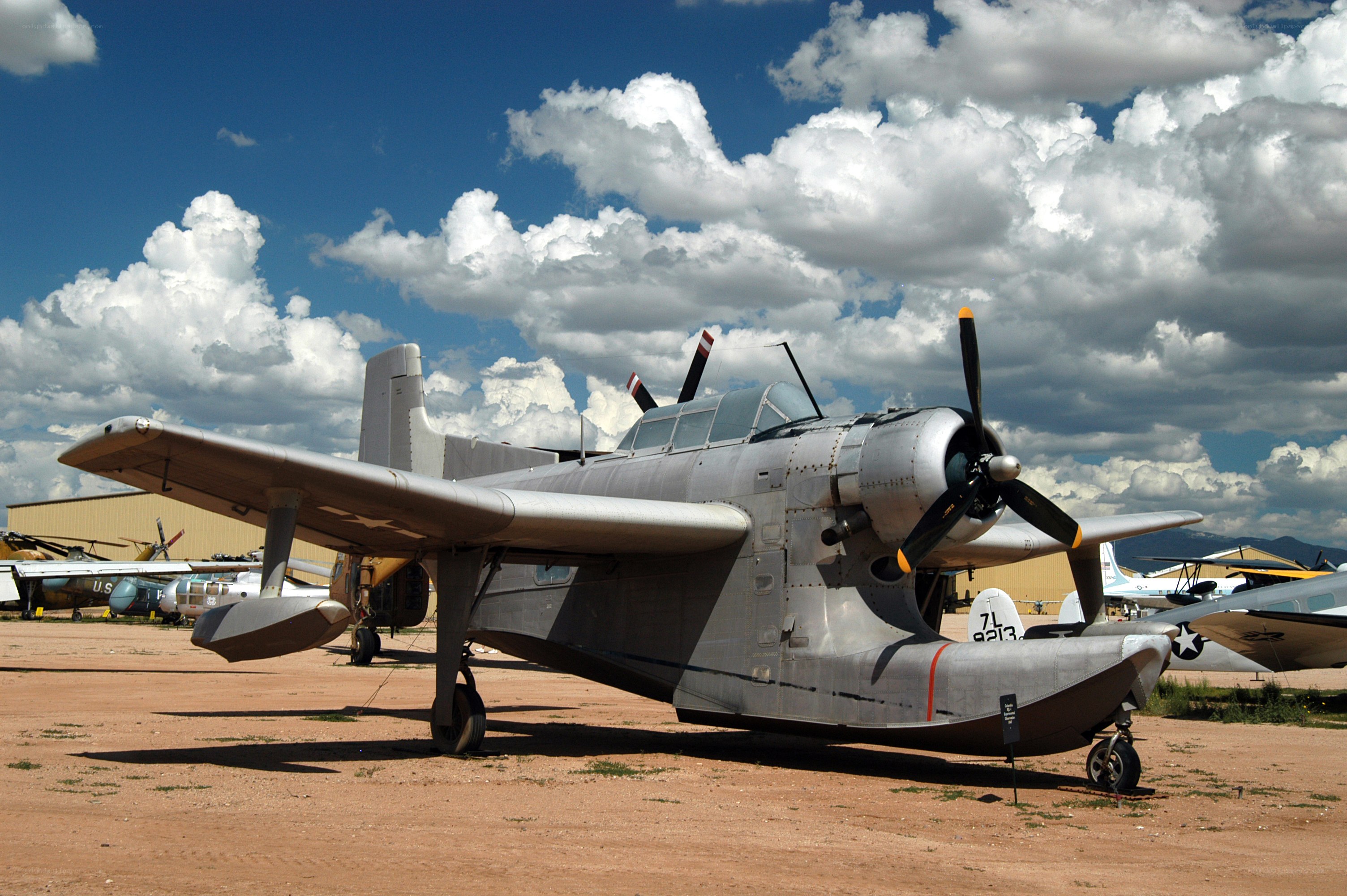 Silver military aircraft on display