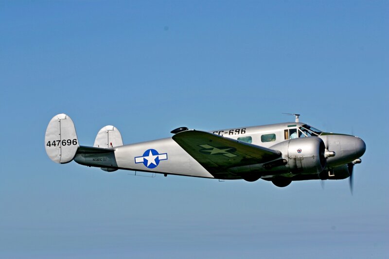 Silver Military Airplane — Blue, Calm