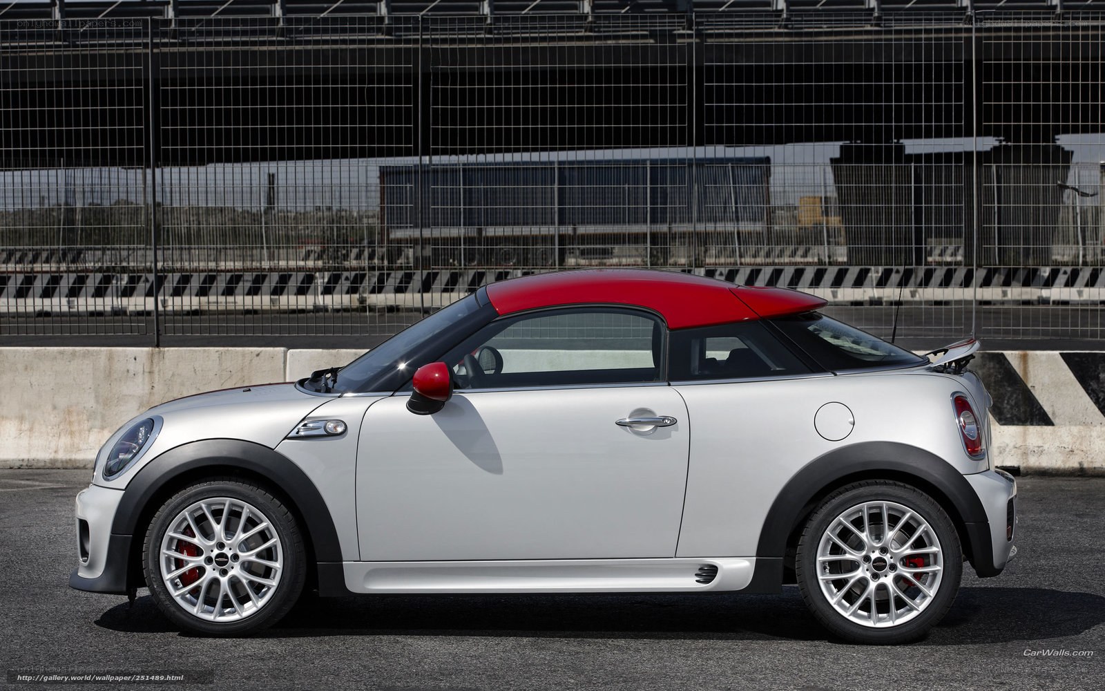 silver mini convertible on track