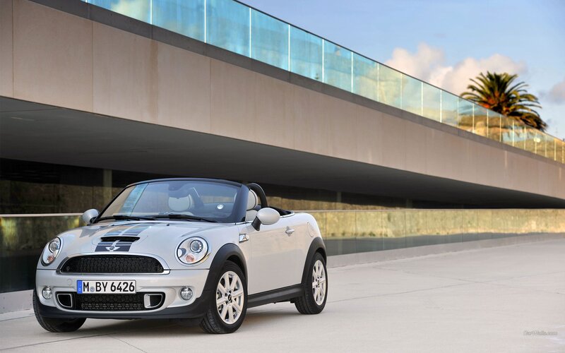Silver MINI Convertible parked