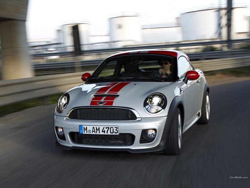 silver mini cooper in motion