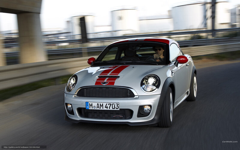 silver mini cooper in motion