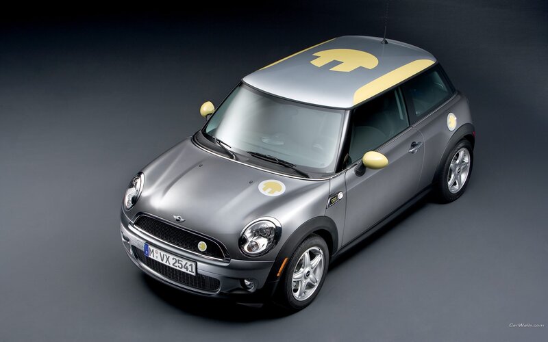 Silver Mini Cooper with yellow accents