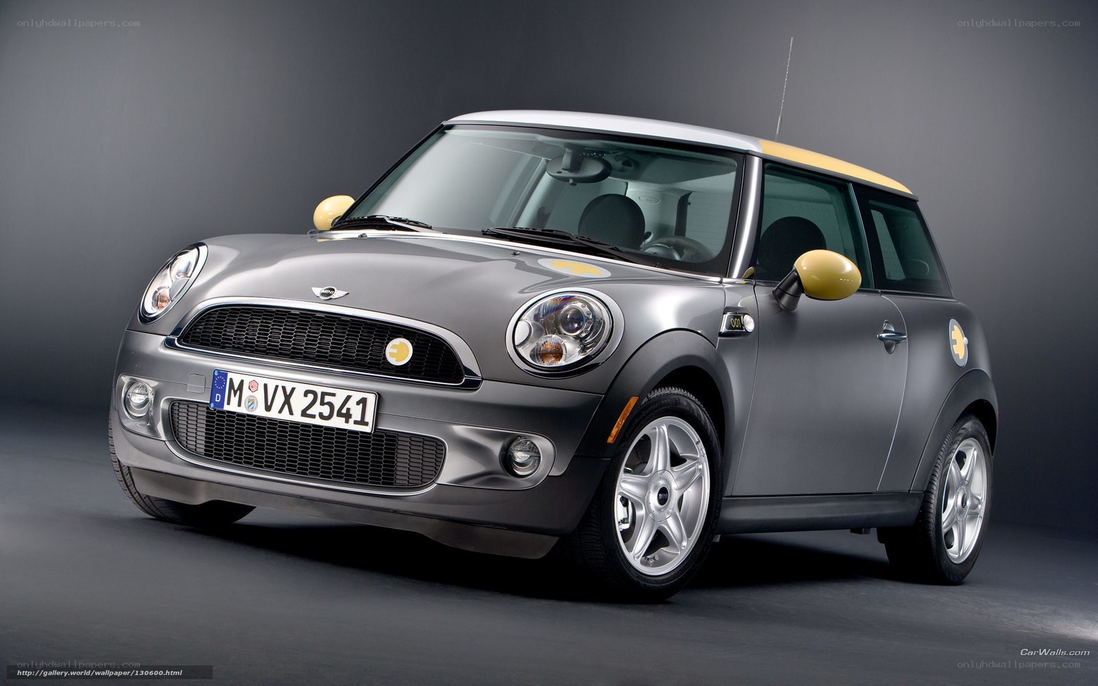 Silver Mini Cooper with yellow accents