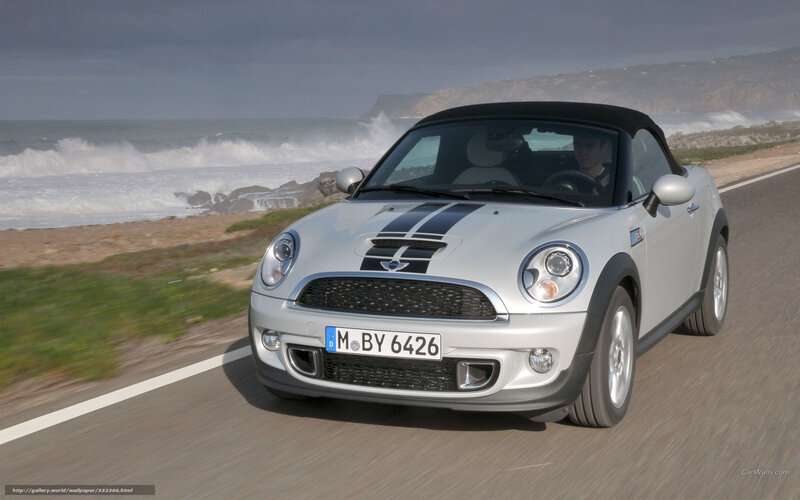 Silver MINI Roadster on coastal road