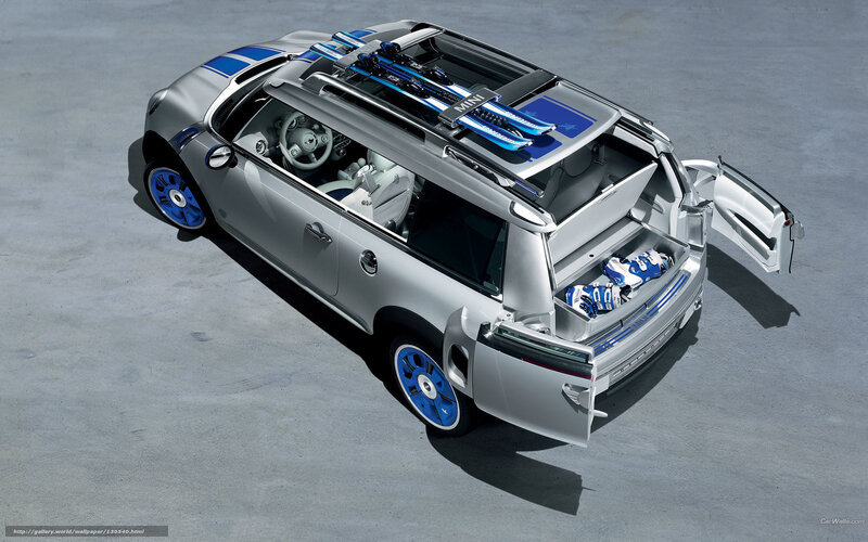 Silver MINI SUV with skis