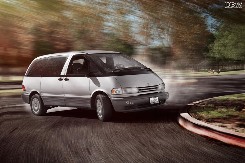 Silver minivan in motion