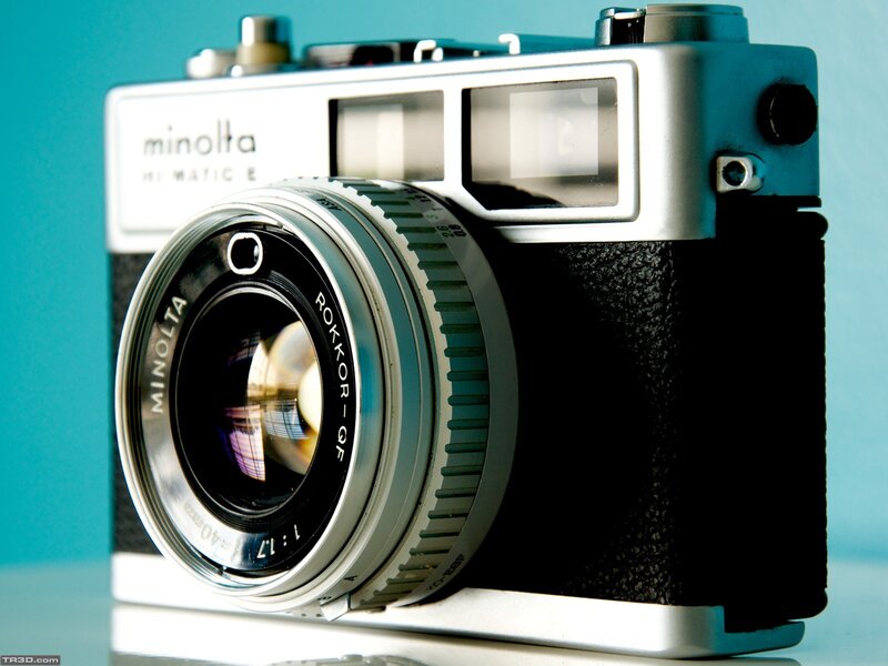 Silver Minolta Camera — Blue