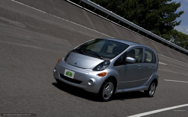 silver mitsubishi i-miev on road