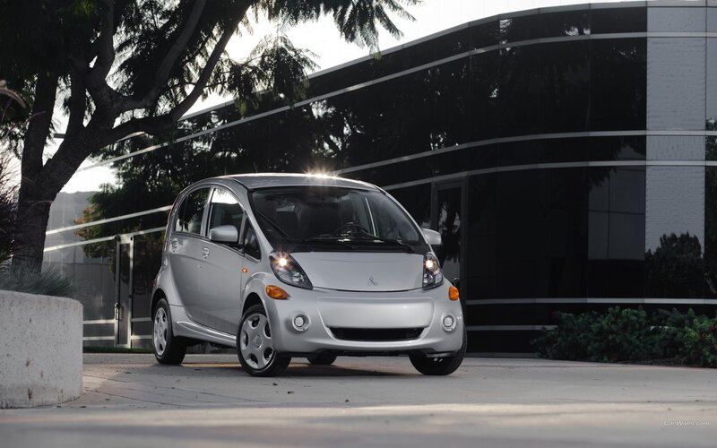 Silver Mitsubishi i-MiEV parked outside