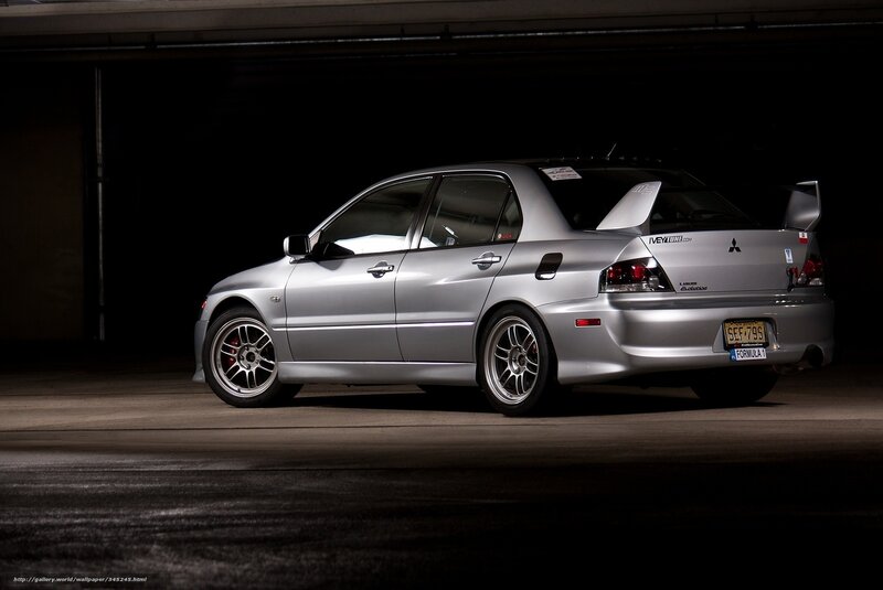 Silver Mitsubishi Lancer — Dramatic, Night