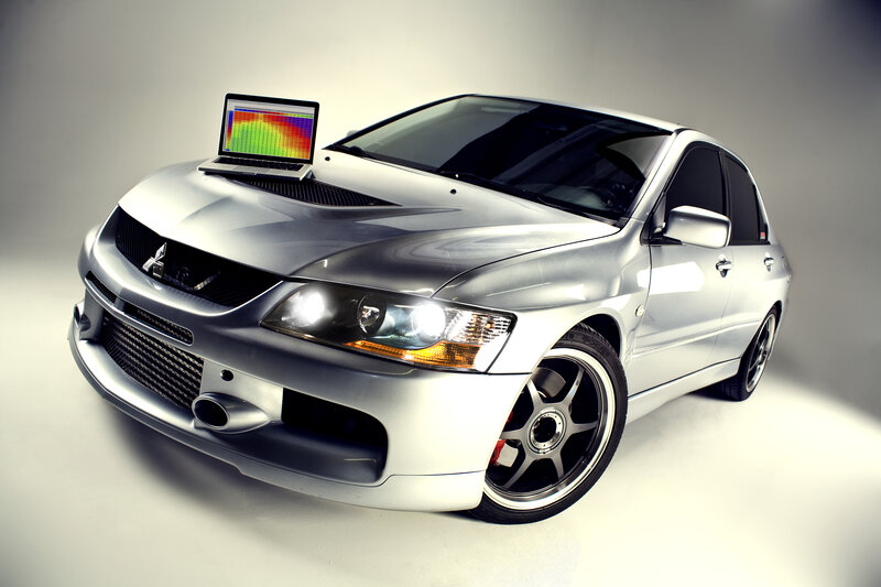 Silver Mitsubishi Lancer — Dramatic, Photograph, Laptop