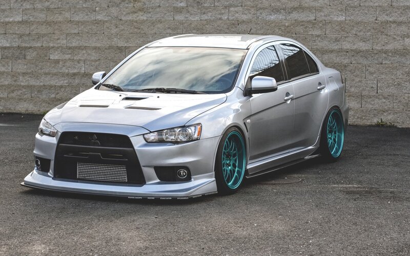 Silver Mitsubishi Lancer — Dramatic, Photograph
