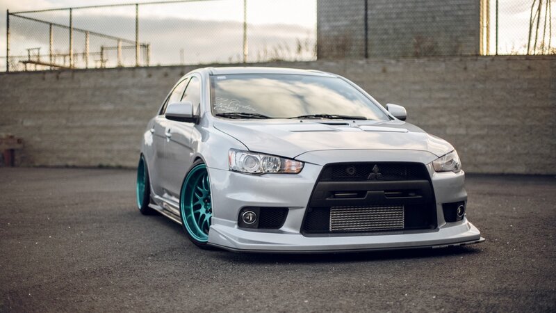 Silver Mitsubishi Lancer — Dramatic, Sunset