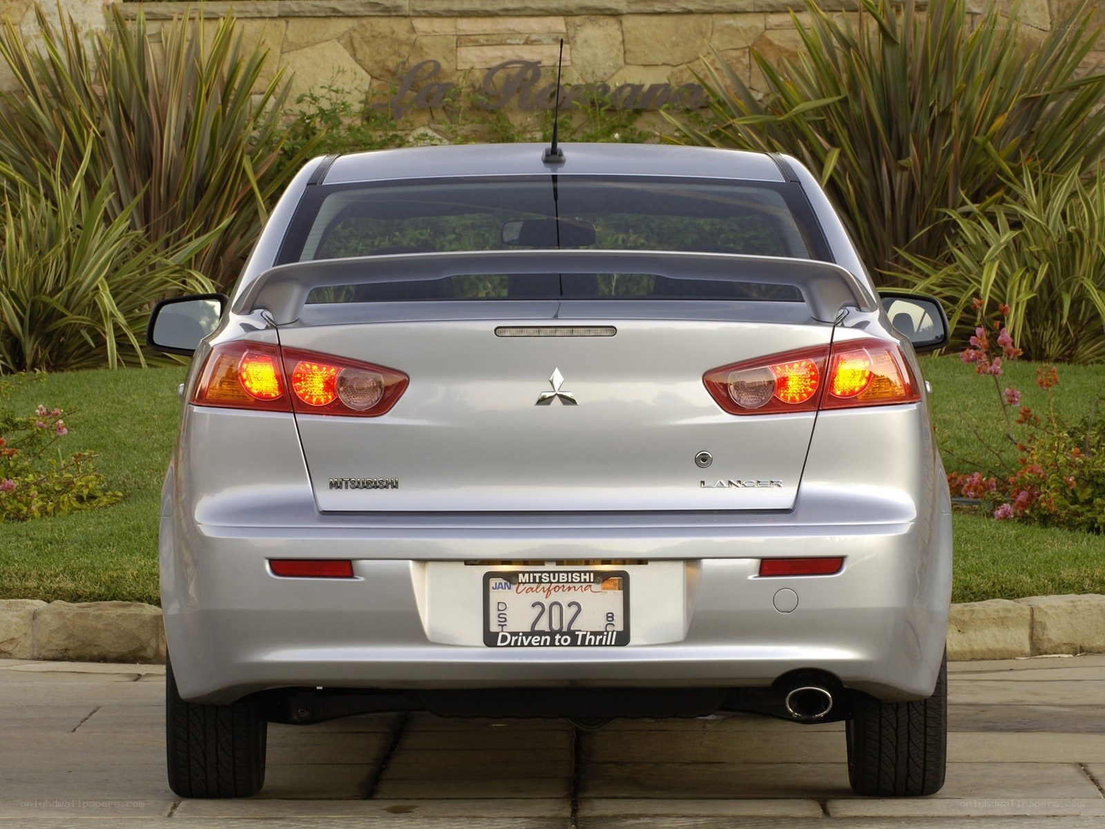 silver mitsubishi lancer rear view