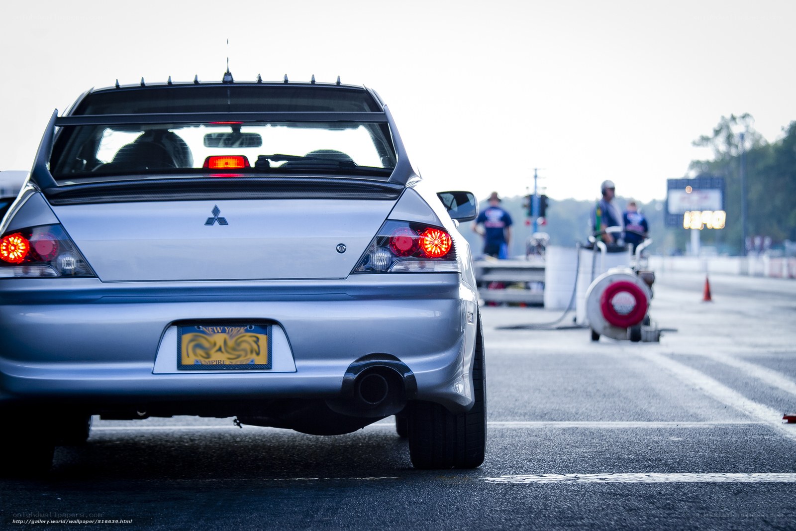 silver mitsubishi on a drag strip