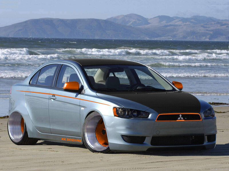 Silver Mitsubishi on beach
